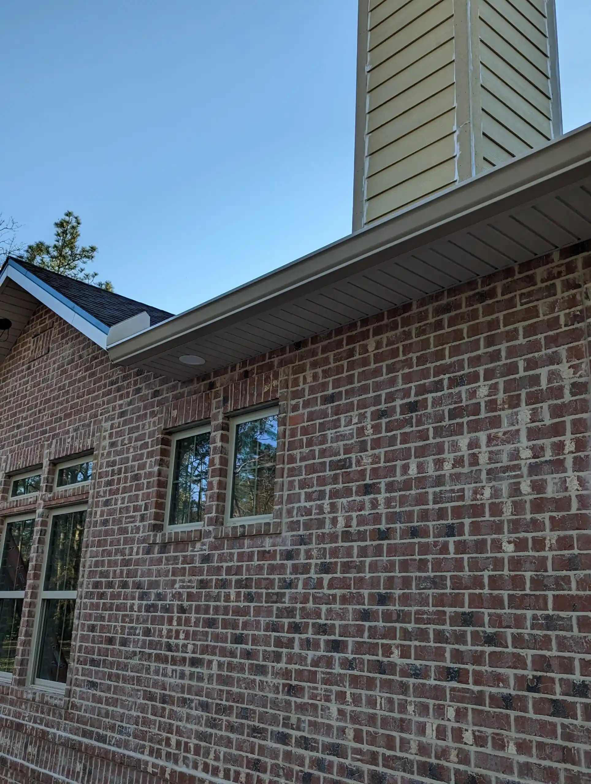 How much should I charge to replace a downspout?