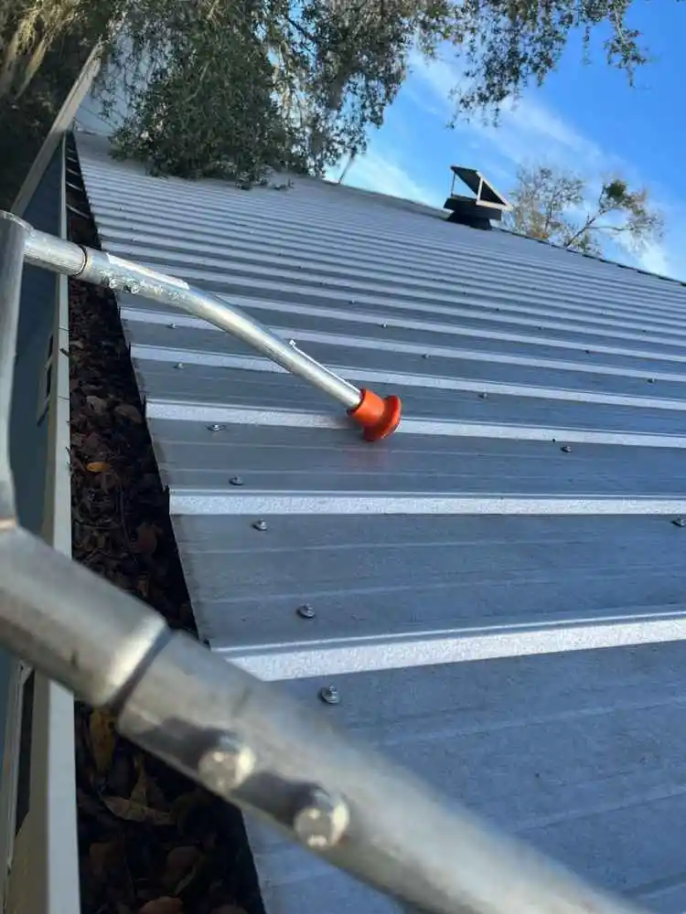 Should gutter cleaning include downspouts?